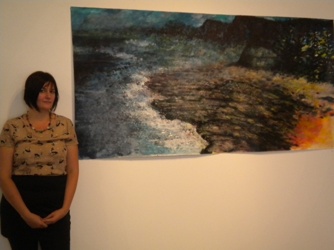 Ellen Jaye Benson with her artwork.